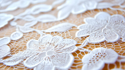 Delicate white lace with floral patterns glimmers softly in warm sunlight