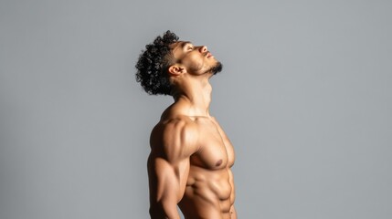 Muscular Man Posing With Head Tilted Back