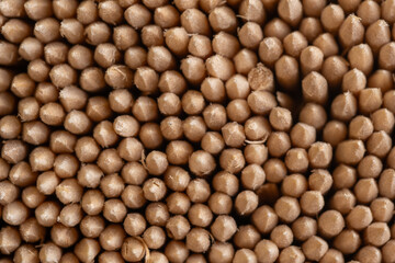 Macro photo small brown wooden toothpicks as background.