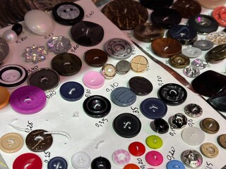 Buttons of different colors and sizes in a sewing accessories store