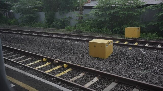 Empty railroad tracks without trains.