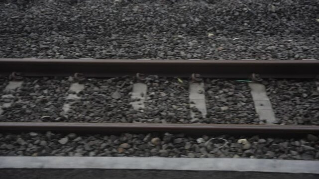 Empty railroad tracks without trains.