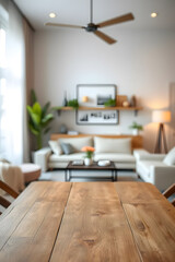 Empty wooden table top with blurred living room interior background. Space for product display and montage.