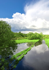 River with a cloudy sky in the background