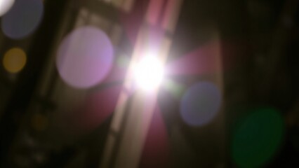 Abstract Light Flare Bokeh Background Glowing Orb and Sunburst Effect