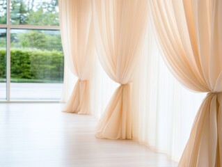 sheer beige curtains gently drape by a window in a bright room