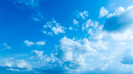 Clear Blue Sky with Dreamy White Clouds