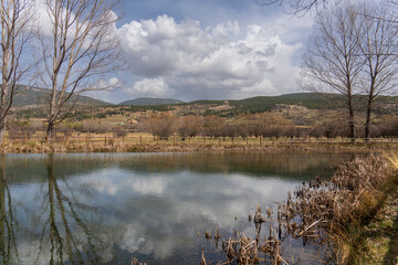 Winter view of the Gudar mountains in Teruel Aragon Spain Reflections on the lake