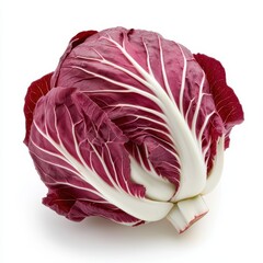 Obraz premium A vibrant red cabbage with white veins, showcasing its crisp texture and rich color, perfect for salads and culinary dishes.