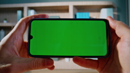 Manager watching content mockup cellphone having work break in office closeup.