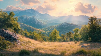 Obraz premium Serene Mountain Landscape with Lush Greenery and Soft Sunset Glow