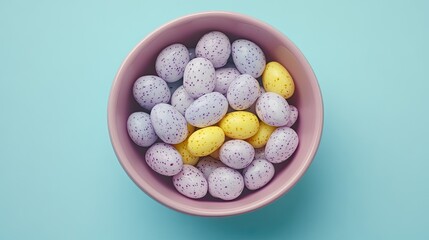 Pastel Candy Eggs in Pink Bowl on Blue Background