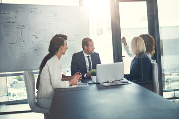 Business people, laptop and meeting in office for planning, sales presentation and corporate collaboration. Investors, startup and tech in agency for new opportunity, discussion or team brainstorming