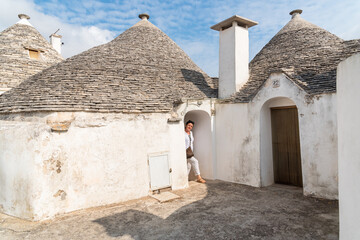 The trulli, typical limestone houses of the ancient village of Alberobello in southern Puglia, Italy