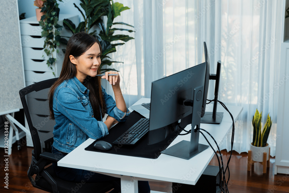 Poster young asian it developer looking online information on pc for beautiful pose with coding program dat