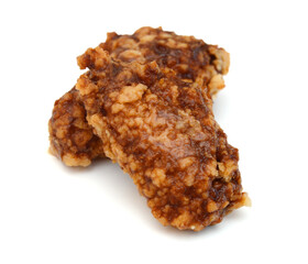 Chicken wings with sauce on white background
