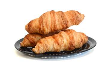 Fresh and tasty croissant over white background