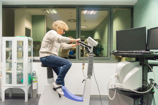 Mature woman undergoing a cardiovascular stress test in a hospital