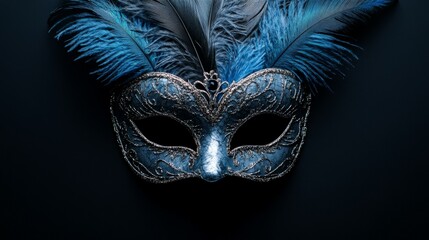 A luxurious black and gold masquerade mask with ornate designs and feathers, highlighting elegance and mystery.