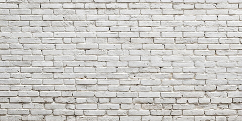 Obraz premium A white brick wall displays a textured surface with various shades and unevenness, creating a rustic yet modern aesthetic suitable for various settings