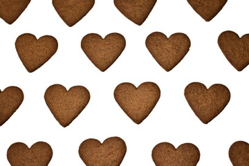Homemade heart shape cookies isolated pattern top view. Cooking Valentines biscuits. Baking handmade love day treats. Heart biscuits in a row.