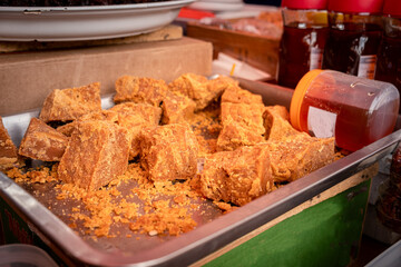 andean sweet called chancaca in a market in la paz - bolivia - gastronomy concept