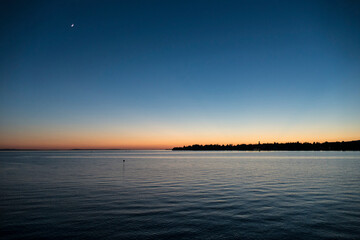 Sunset at lake Bodensee, Lindau Harbour, in Bavaria, Germany