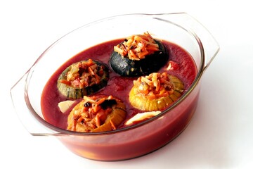 stuffed round zucchinies rice and vegetables in tomatoes sauce