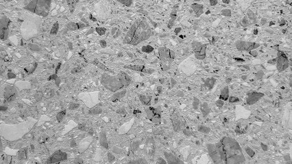 A grey and white background with a lot of rocks