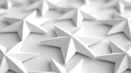 White textured stars on white surface, blurred background