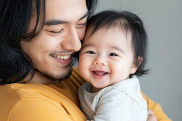 happy father and baby bonding