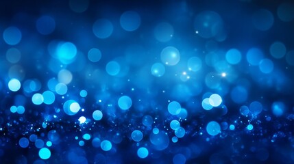 Beautiful blue sparkling lights create an abstract and dreamy background.