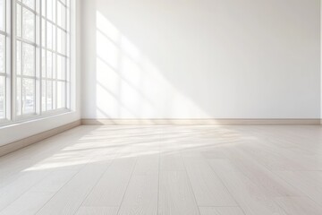 Empty room with light-colored flooring and clean white walls.