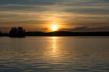 A scenic lake view in the forests of Finland in spring time