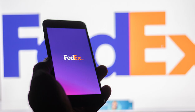  FedEx logo is displayed on a smartphone screen.