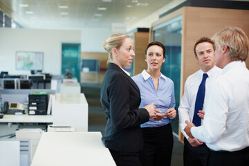 Teamwork, business people and meeting in office for finance, accounting or bookkeeping in agency. Group, talking and career as payroll, management and professional in corporate bank for collaboration