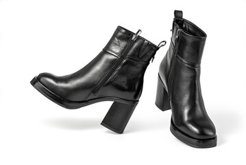 Female elegant high heeled leather ankle boots. Isolated on a white background with clipping path included