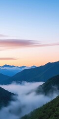 Fototapeta premium The sky is a beautiful mix of blue and pink hues, creating a serene and peaceful atmosphere. The mountains in the background add to the sense of tranquility and majesty