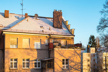 View of an old yellow brick house in a sunrise light in winter. Nuremberg, Germany