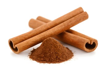 Cinnamon sticks and powder positioned crosswise isolated on white background