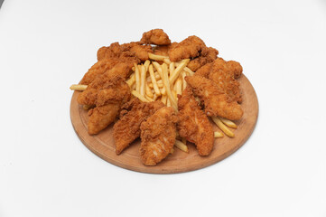fried crispy wings, chicken nuggets, onion rings and french fries