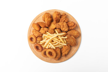 fried crispy wings, chicken nuggets, onion rings and french fries