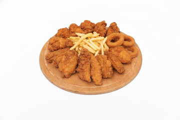 fried crispy wings, chicken nuggets, onion rings and french fries