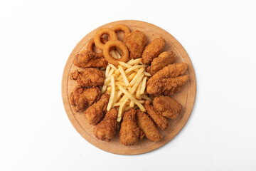 fried crispy wings, chicken nuggets, onion rings and french fries
