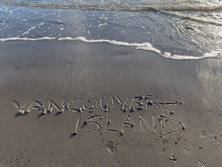 Vancouver Island written in the sand