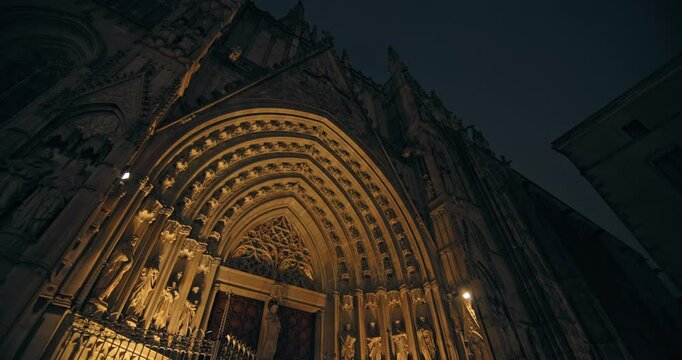 La Catedral de la Santa Cruz y Santa Eulalia walks through night Barcelona. Beautiful architecture, cityscape, tourist streets of Spanish cities. High quality 4k footage