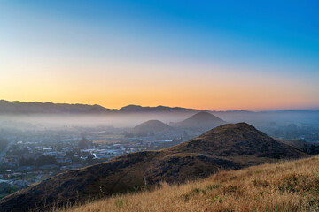 View of Hills, mountains with grass at sunrise, sunset