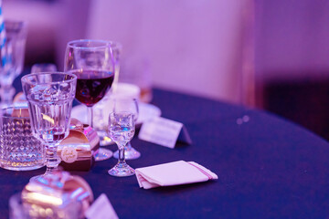 Close-up of party table, vodka glass
