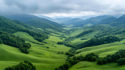 Aerial view of lush green valley, mountains, cloudy sky. Background rolling hills, nature. Use travel brochure