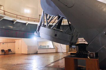 Old wooden floor with numerous cracks, showing signs of wear and tear over time